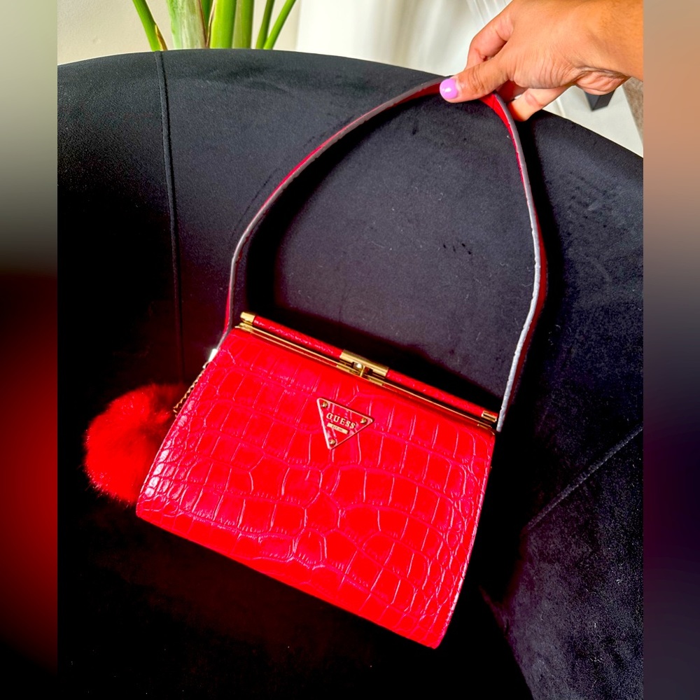 Guess shoulder bag in red.